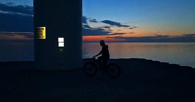 sunset on the pier at pentwater